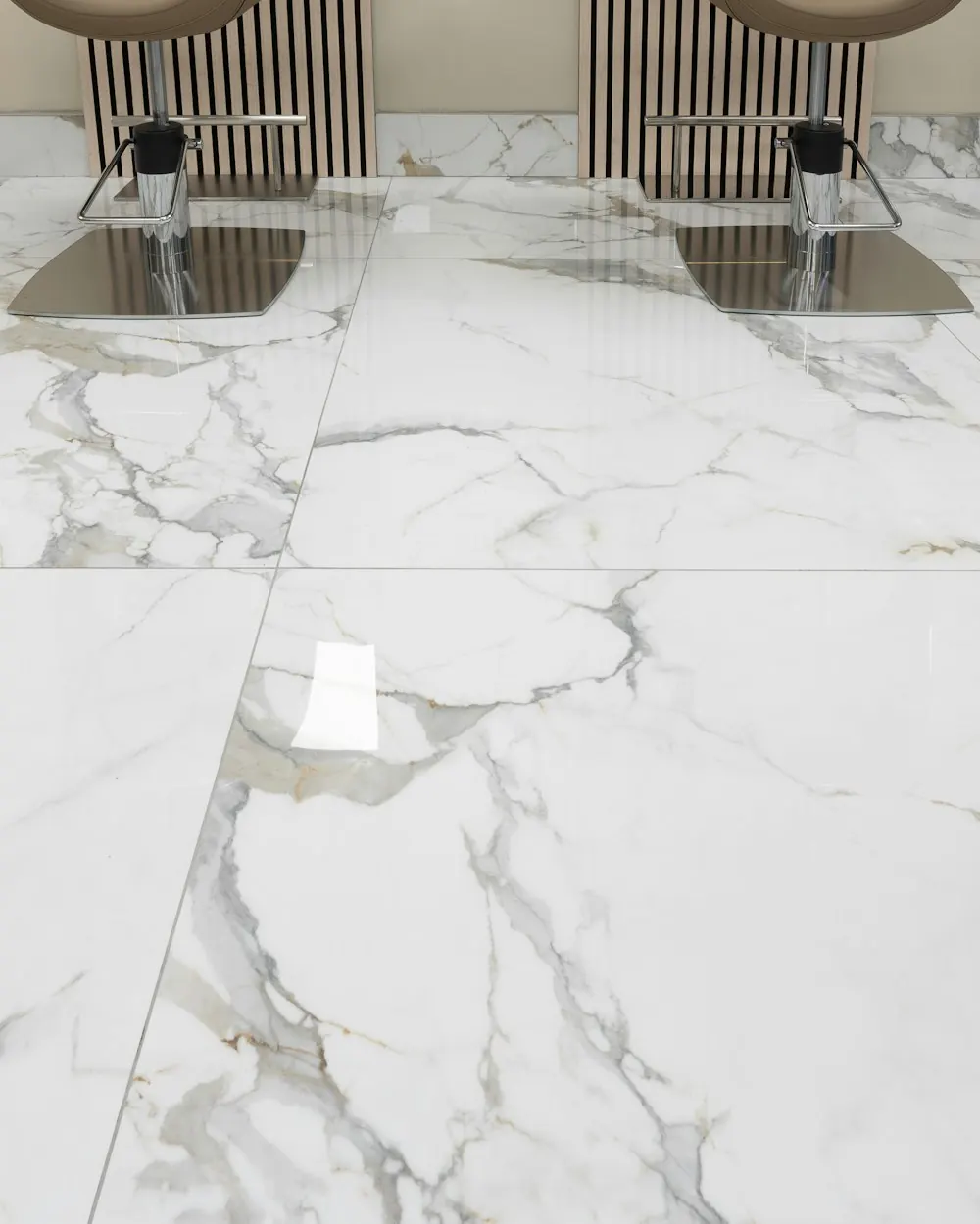 Large-format marble-look porcelain tile floor