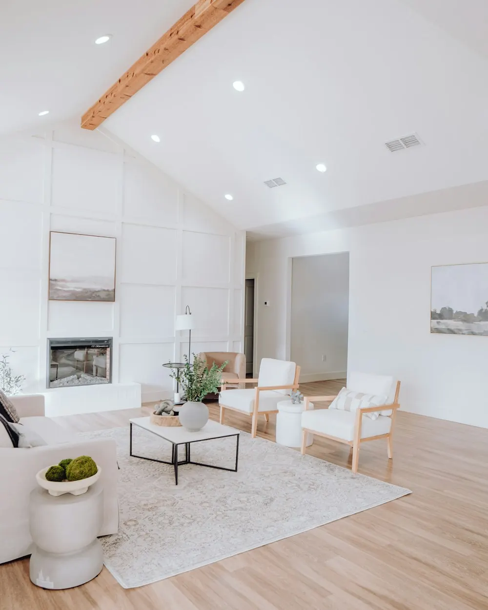Bright living room with new light oak hardwood flooring